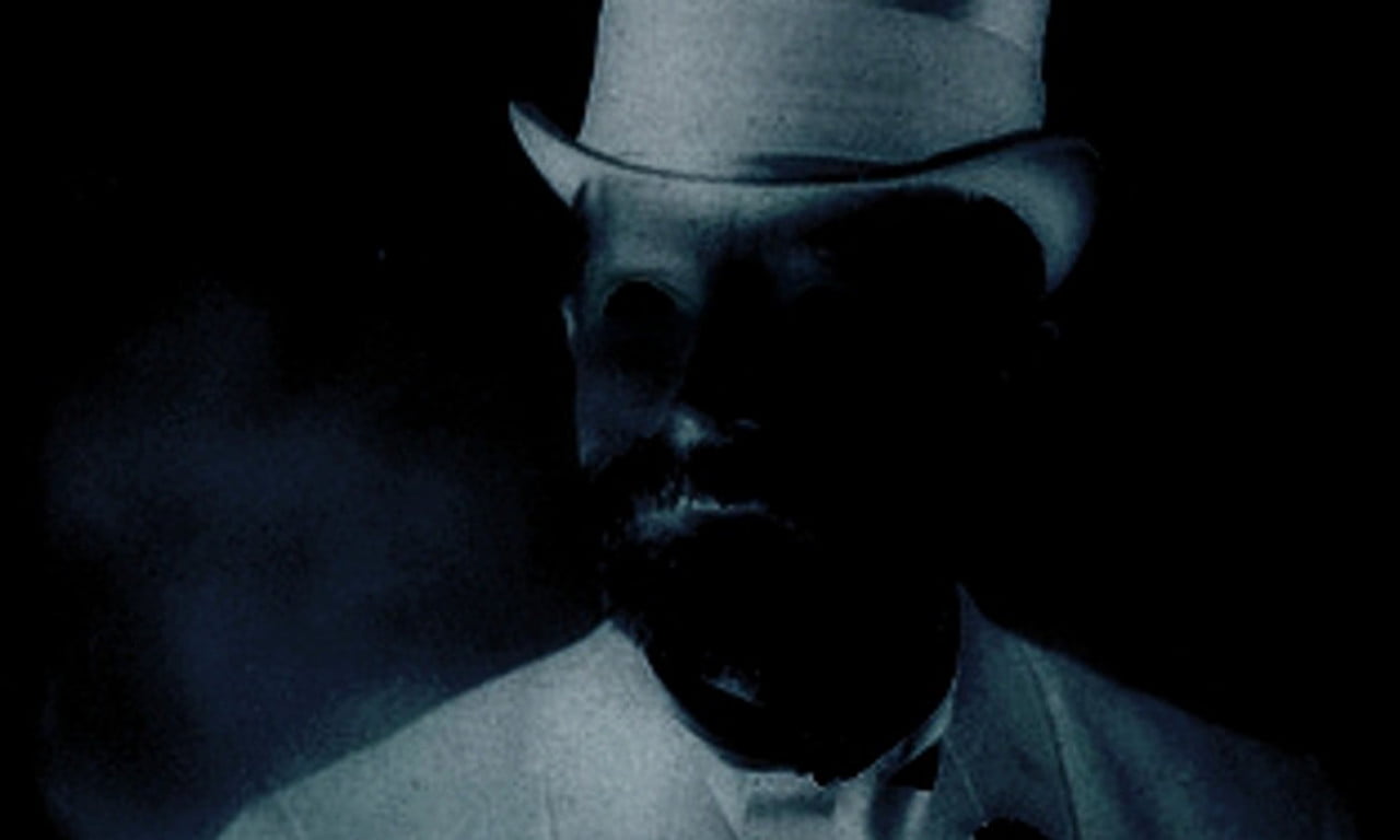A shadowy figure wearing a top hat