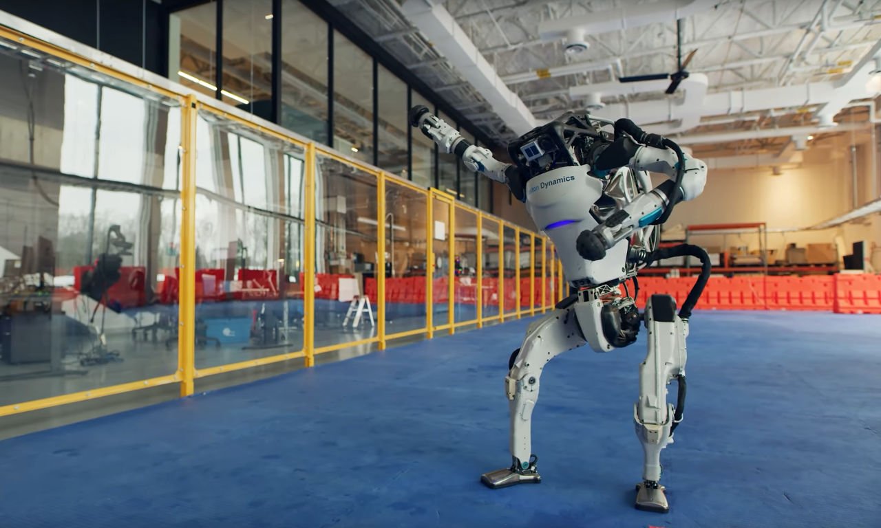 A Boston Dynamics Atlas robot dances to the beat