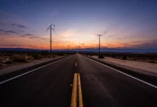 An empty highway at dusk